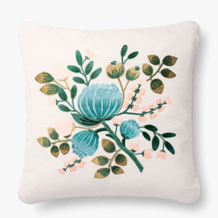 Cojín blanco con Flor azul